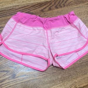 Lululemon size 8 speed ups, very rare color that is hot pink and light pink